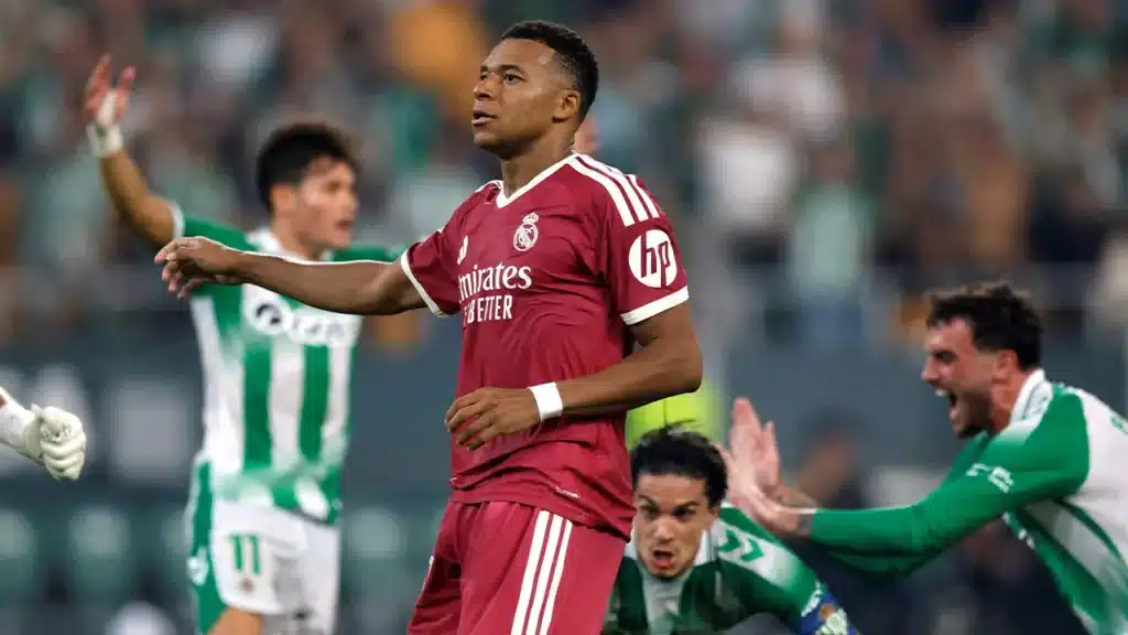 Mbappe penalty retake Betis controversy involving Marc Bartra encroachment