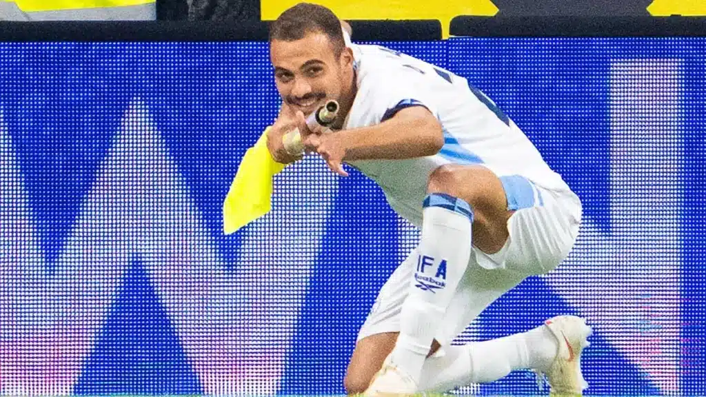 Saied Abu Farchi is sent off after celebrating his goal in Austria vs Israel